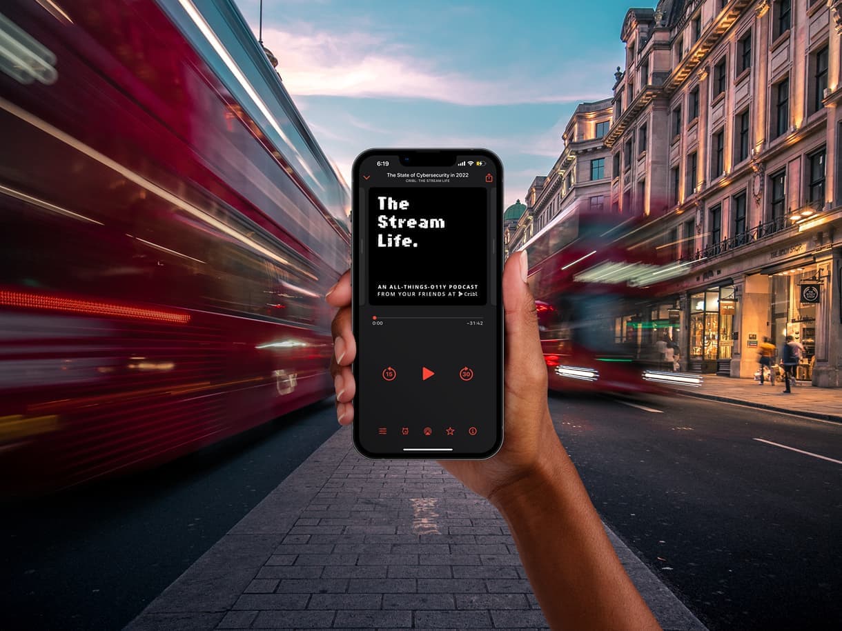 mockuuups-holding-smartphone-mockup-on-the-street