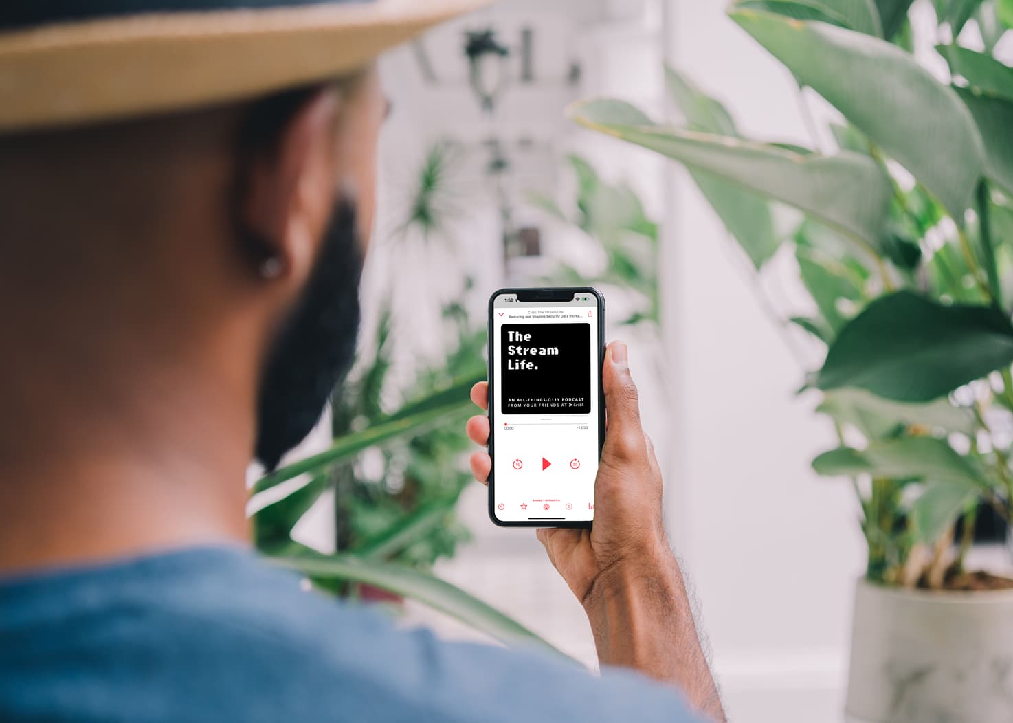 mockuuups-iphone-mockup-with-flowers-in-the-background