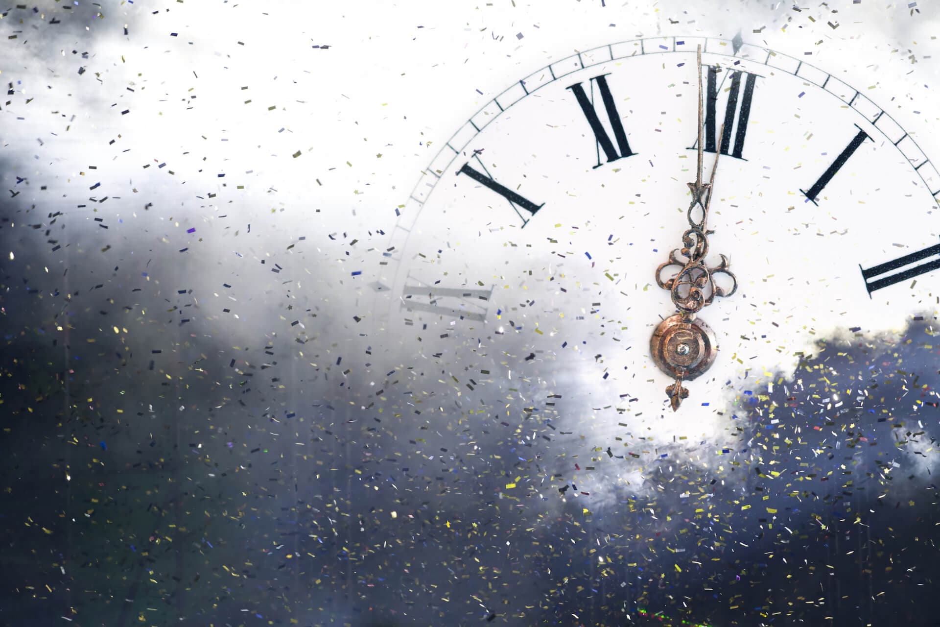 New Year’s at midnight – Old clock and holiday lights