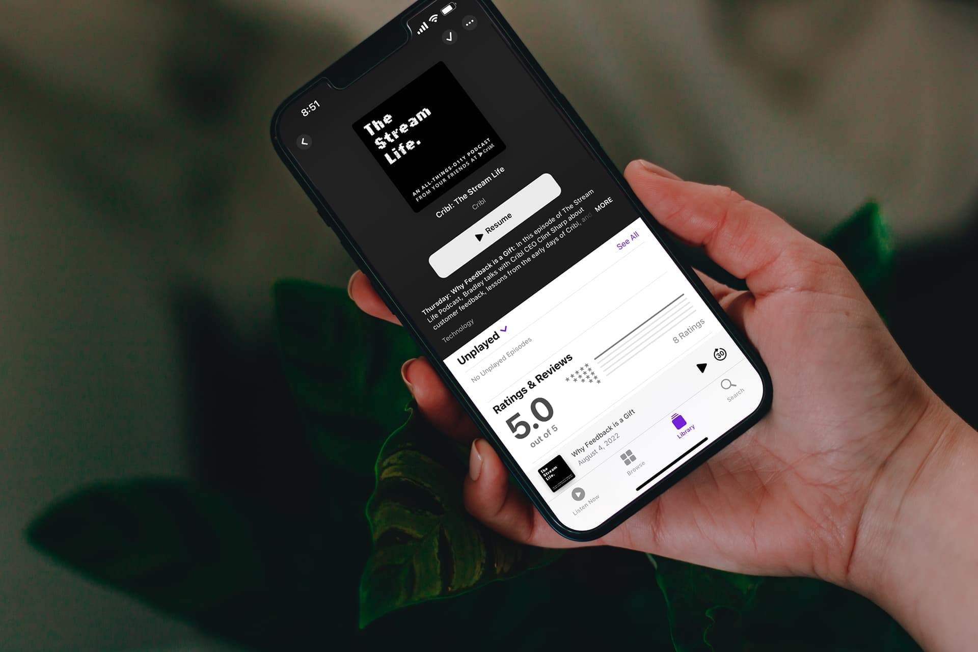 mockuuups-person-holding-up-an-iphone-13-pro-mockup