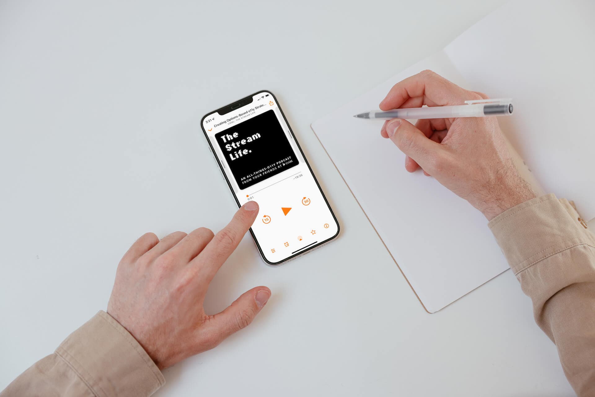 mockuuups-iphone-mockup-on-a-white-table-with-a-textbook-at-the-side